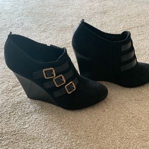 Black suede wedge shoes
